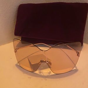 JIMMY CHOO Zelma Shield Rimless Sunglasses.